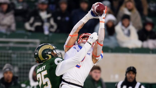 Nov 29, 2019; Fort Collins, CO, USA; Boise State Broncos wide receiver Khalil Shakir (2) pulls in a reception over Colorado State Rams cornerback Keevan Bailey (25) in the fourth quarter at Sonny Lubick Field at Canvas Stadium. Mandatory Credit: Ron Chenoy-USA TODAY Sports